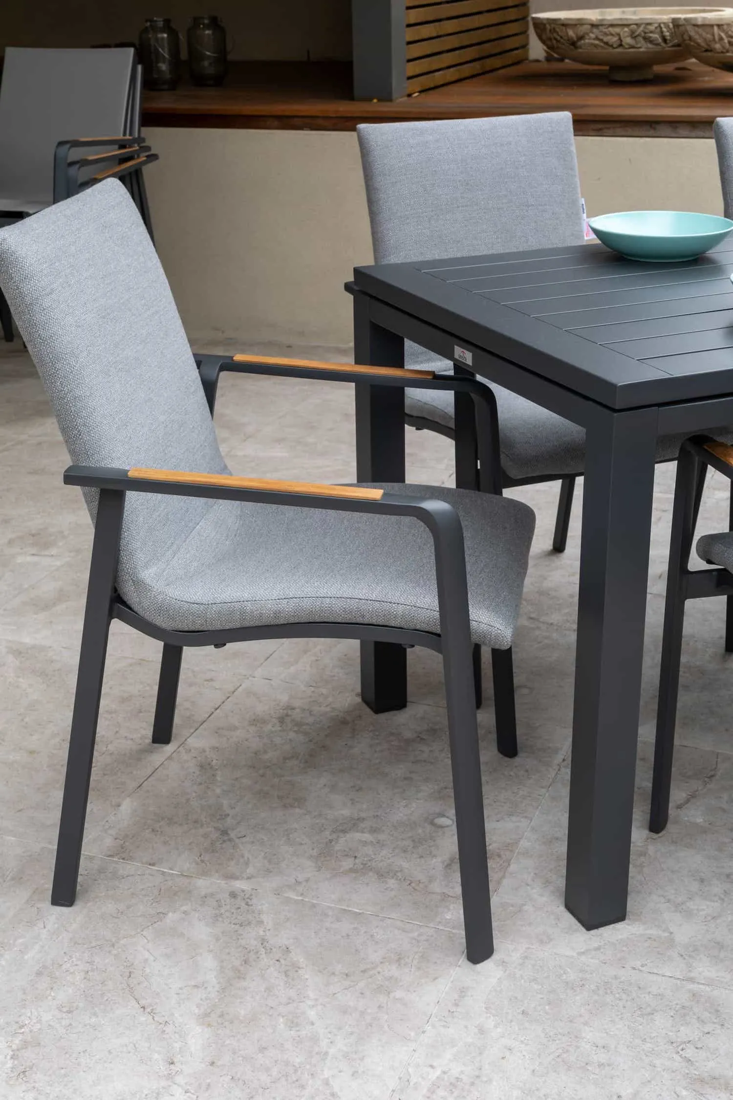 Cruz Padded Sling Carver Chair | Aluminium & Teak & Sunbrella